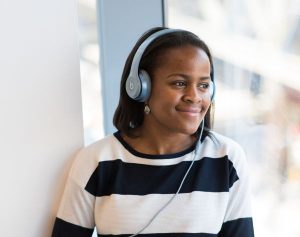 Woman listening to podcast